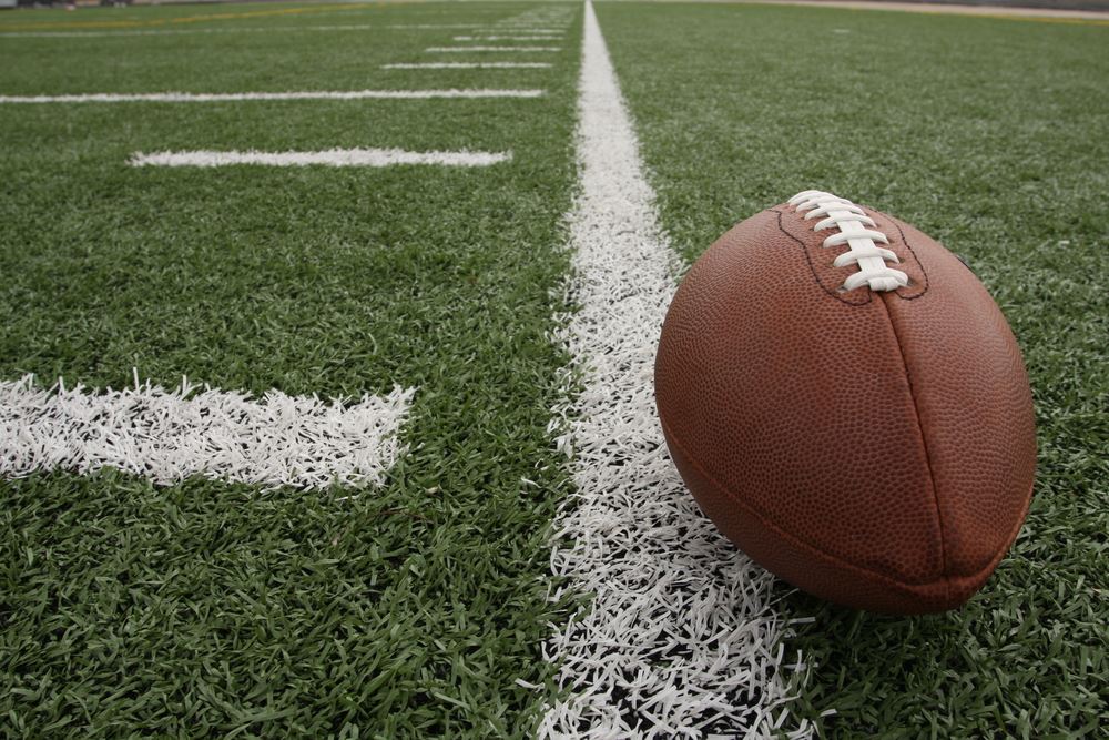 Pro Football Hall of Fame to settle lawsuit in 2016 turf game